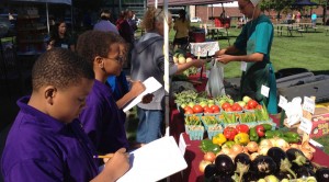 Students from Citizens Leadership Academy at a local farmers market