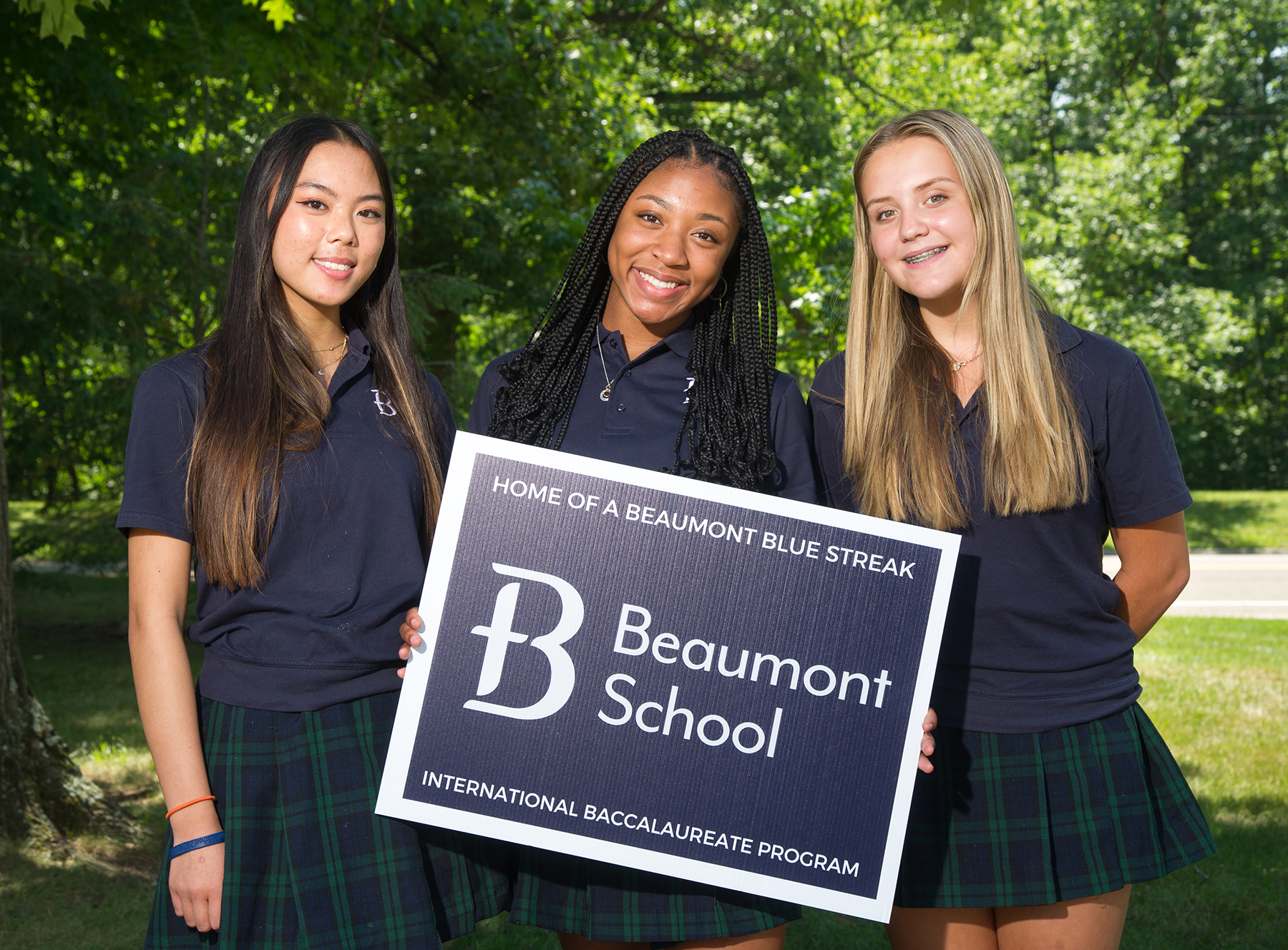 Beaumont Girls with sign Breakthrough Public Schools BPS